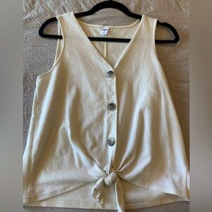 Sleeveless, cream, textured shirt. Worn less than 5 times.